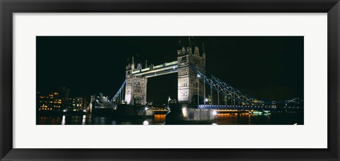 Framed Bridge lit up at night, Tower Bridge, London, England Print