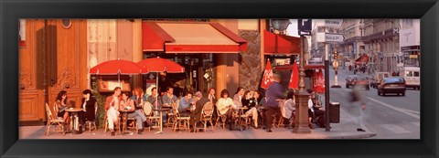 Framed Tourists at a sidewalk cafe, Paris, France Print