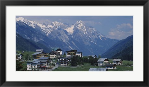 Framed High angle view of a village on a landscape and a mountain range in the background, St. Anton, Austria Print