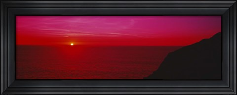 Framed Sunset over the ocean, California, USA Print