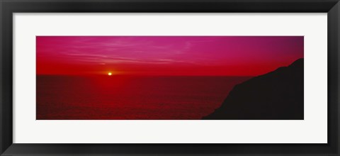 Framed Sunset over the ocean, California, USA Print