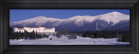Framed Hotel near snow covered mountains, Mt. Washington Hotel Resort, Mount Washington, Bretton Woods, New Hampshire, USA Print