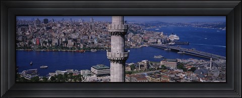 Framed Mid section view of a minaret with bridge across the bosphorus in the background, Istanbul, Turkey Print