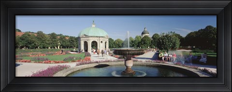 Framed Germany, Munich, Hofgarten, Tourist sitting in the park Print