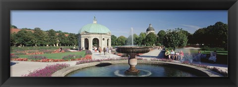 Framed Germany, Munich, Hofgarten, Tourist sitting in the park Print