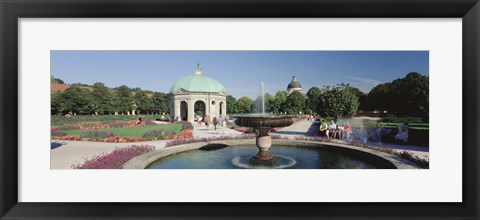 Framed Germany, Munich, Hofgarten, Tourist sitting in the park Print