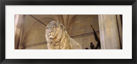 Framed Germany, Munich, Lion sculpture in front of a building Print