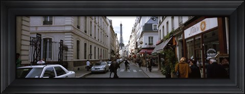 Framed Buildings along a street with a tower in the background, Rue Saint Dominique, Eiffel Tower, Paris, Ile-de-France, France Print