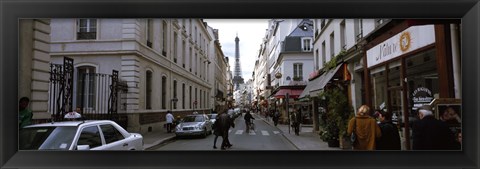 Framed Buildings along a street with a tower in the background, Rue Saint Dominique, Eiffel Tower, Paris, Ile-de-France, France Print