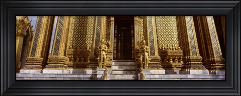 Framed Low angle view of statues in front of a temple, Phra Mondop, Grand Palace, Bangkok, Thailand Print