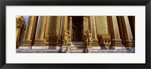 Framed Low angle view of statues in front of a temple, Phra Mondop, Grand Palace, Bangkok, Thailand Print