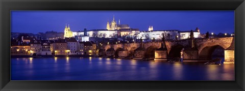 Framed Bridge across a river lit up at night, Charles Bridge, Vltava River, Prague, Czech Republic Print