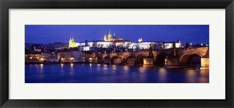 Framed Bridge across a river lit up at night, Charles Bridge, Vltava River, Prague, Czech Republic Print