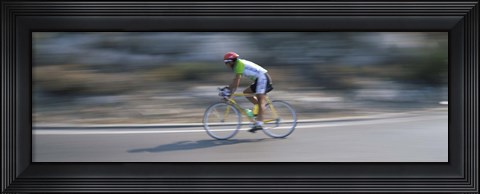 Framed Bike racer participating in a bicycle race, Sitges, Barcelona, Catalonia, Spain Print