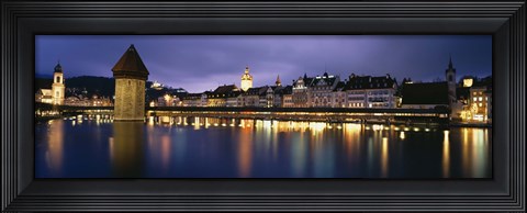 Framed Buildings lit up at dusk, Chapel Bridge, Reuss River, Lucerne, Switzerland Print