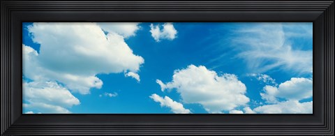 Framed Clouds against a pale blue sky Print