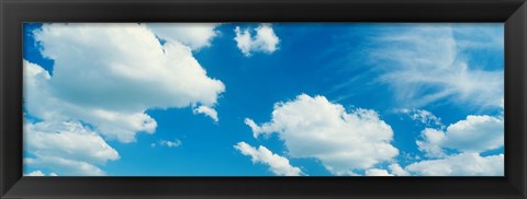 Framed Clouds against a pale blue sky Print