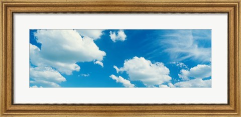 Framed Clouds against a pale blue sky Print