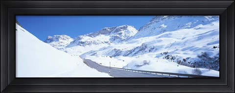 Framed Snow covered mountains on both sides of a road, St Moritz, Graubunden, Switzerland Print