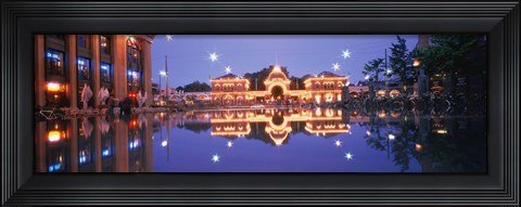 Framed Buildings in an amusement park lit up at dusk, Tivoli Gardens, Copenhagen, Denmark Print