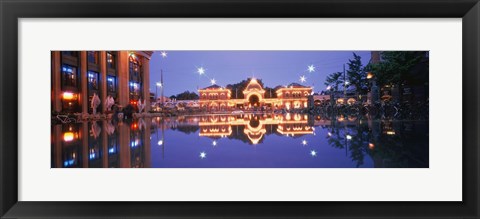 Framed Buildings in an amusement park lit up at dusk, Tivoli Gardens, Copenhagen, Denmark Print