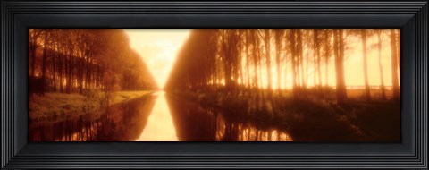 Framed Belgium, tree lined waterway through countryside, sepia tone Print