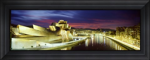 Framed Buildings lit up at dusk, Guggenheim Museum Bilbao, Bilbao, Vizcaya, Spain Print