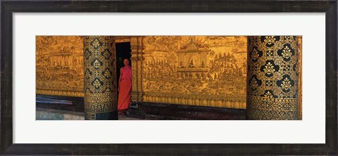 Framed Monk in prayer hall at Wat Mai Buddhist Monastery, Luang Prabang, Laos Print