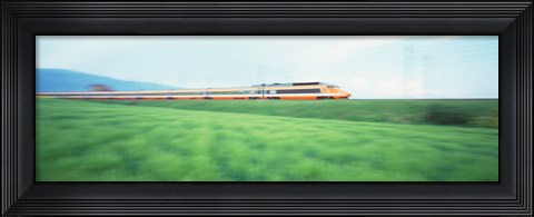 Framed TGV High-speed Train passing through a grassland Print