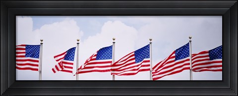Framed Low angle view of American flags fluttering in wind Print