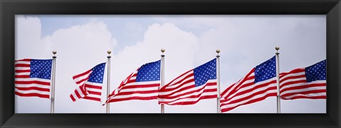 Framed Low angle view of American flags fluttering in wind Print