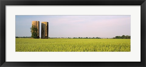 Framed USA, Arkansas, View of grain silos in a field Print