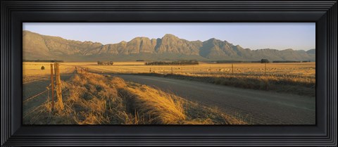 Framed Road running through a farm, South Africa Print