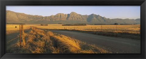Framed Road running through a farm, South Africa Print