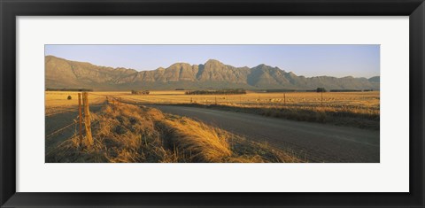 Framed Road running through a farm, South Africa Print