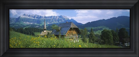 Framed Chalet and a church on a landscape, Emmental, Switzerland Print