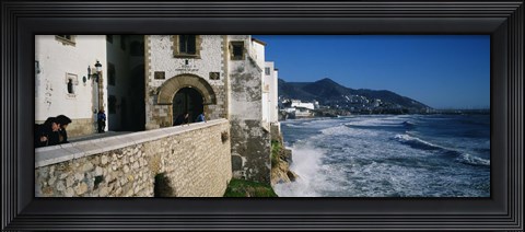 Framed Tourists in a church beside the sea, Sitges, Spain Print