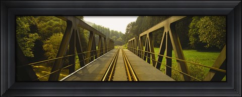Framed Railroad tracks passing through a bridge, Germany Print