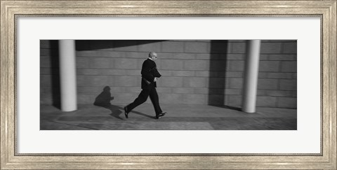 Framed Side Profile Of A Businessman Running With A Briefcase, Germany Print