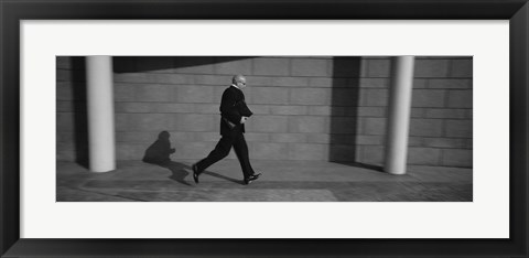 Framed Side Profile Of A Businessman Running With A Briefcase, Germany Print