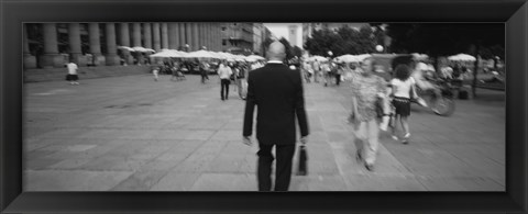 Framed Rear view of a businessman walking on the street, Stuttgart, Germany Print