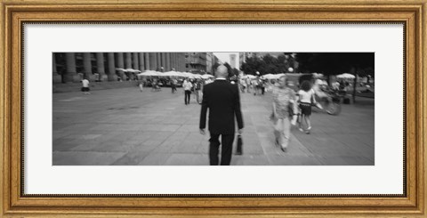 Framed Rear view of a businessman walking on the street, Stuttgart, Germany Print