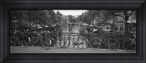 Framed Bicycle Leaning Against A Metal Railing On A Bridge, Amsterdam, Netherlands Print