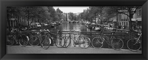 Framed Bicycle Leaning Against A Metal Railing On A Bridge, Amsterdam, Netherlands Print