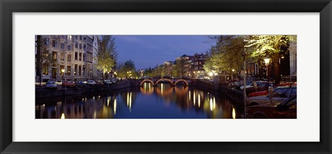 Framed Night View Along Canal Amsterdam The Netherlands Print