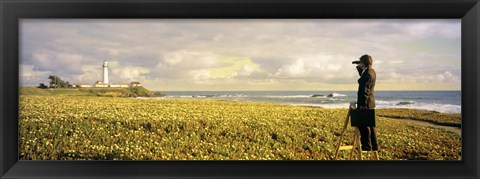 Framed USA, California, Businessman standing holding binoculars and looking at the lighthouse Print