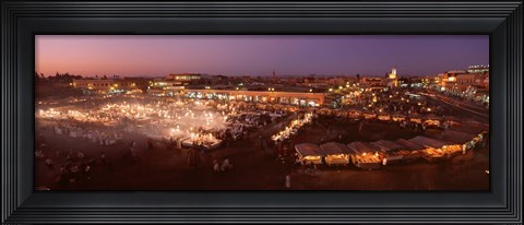 Framed High angle view of a market lit up at dusk, Djemaa El Fna, Medina Quarter, Marrakesh, Morocco Print