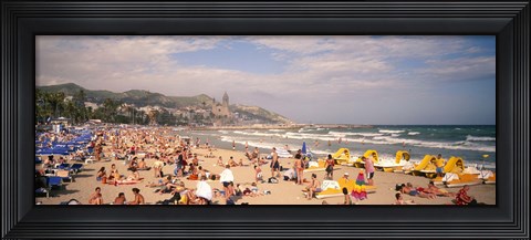 Framed Tourists on the beach, Sitges, Spain Print