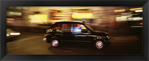Framed England, London, Black cab in the night Print