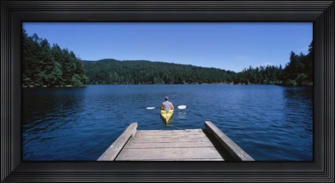 Framed Rear view of a man on a kayak in a river, Orcas Island, Washington State, USA Print